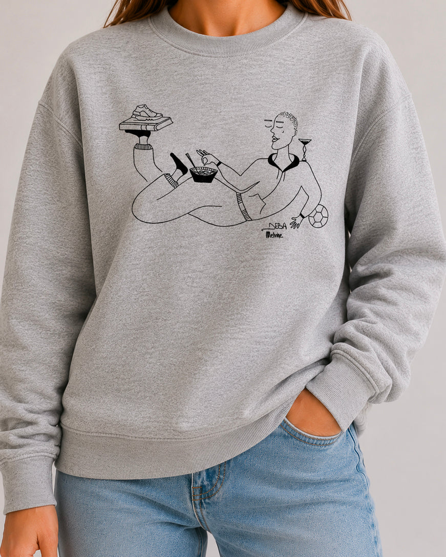 Sweat-Shirt « Jongler entre les mondes » par Melvine Deba